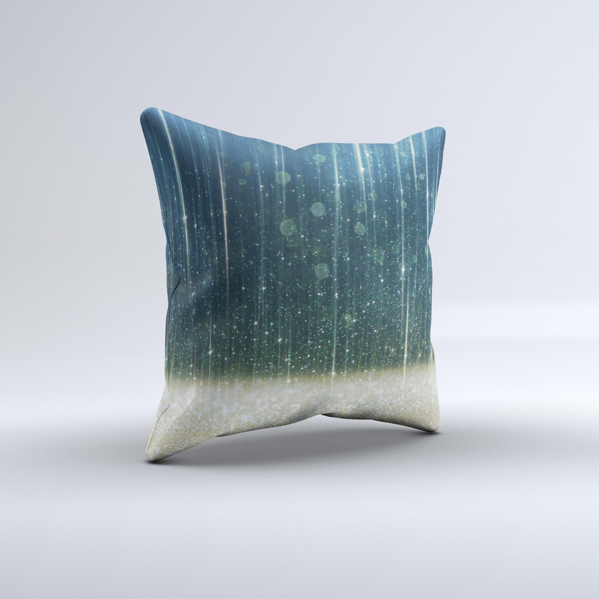 A handcrafted decorative throw pillow featuring a scratched blue and gold design, showcasing unique patterns and textures.