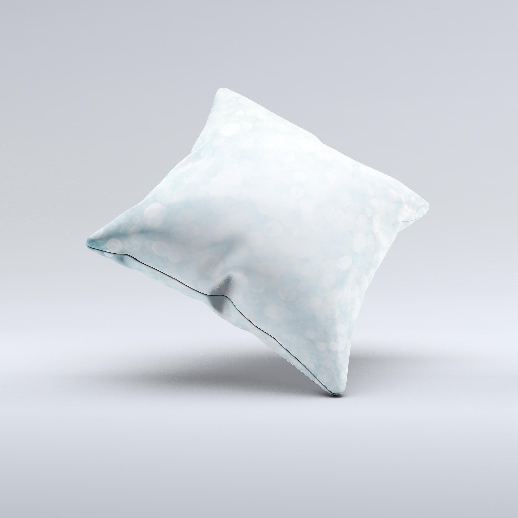 A decorative throw pillow featuring an unfocused blue orb lights design, handcrafted in Virginia with high-quality materials.