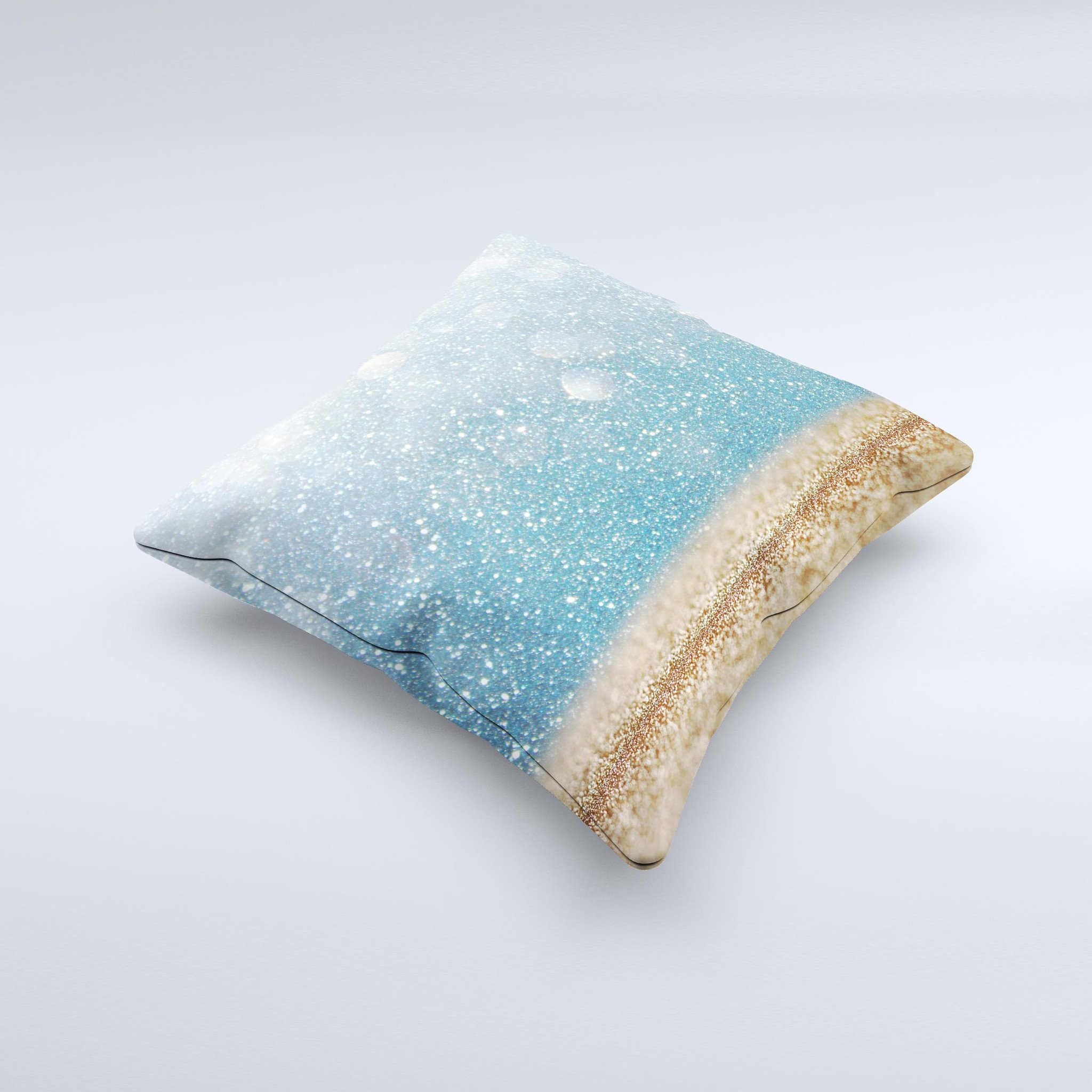 A beautifully handcrafted throw pillow featuring an unfocused radiant beach scene, showcasing vibrant colors and unique design imperfections.