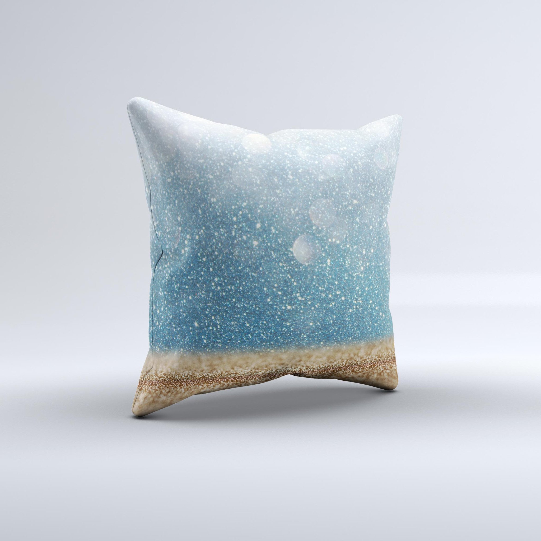 A beautifully handcrafted throw pillow featuring an unfocused radiant beach scene, showcasing vibrant colors and unique design imperfections.