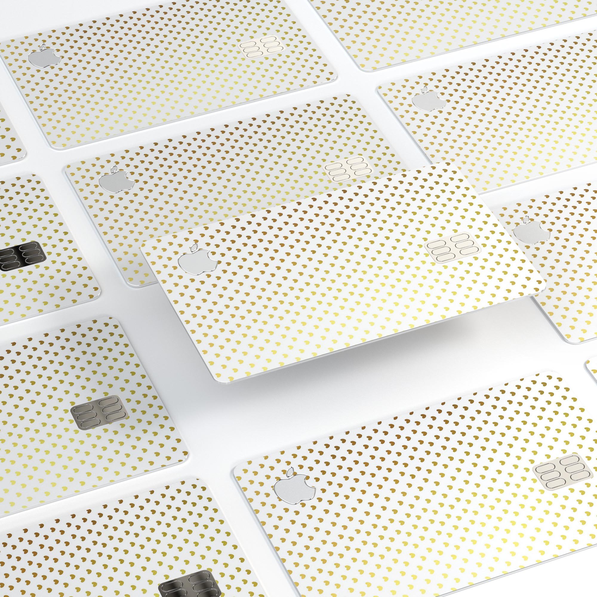 Tiny Golden Hearts Pattern decal skin for Apple Card, showcasing a stylish design with protective features.