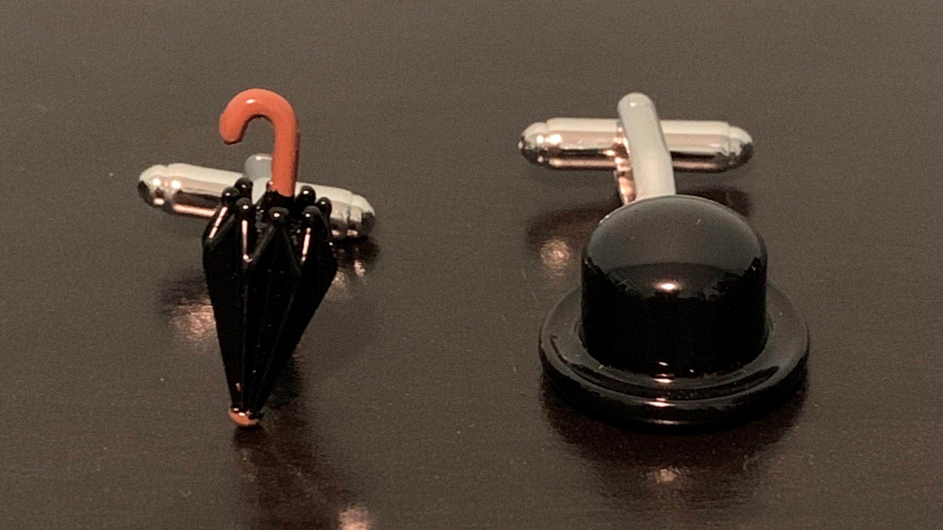 Elegant Tools of the Trade Cufflinks featuring a bowler hat and umbrella design, perfect for the modern gentleman.