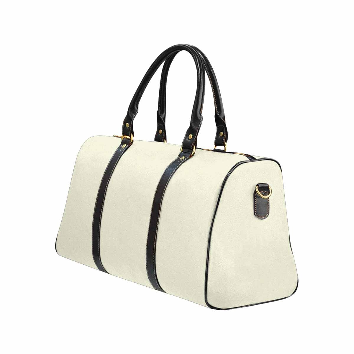 Beige leather carry on large luggage bag with spacious compartments and stylish design, perfect for travel.