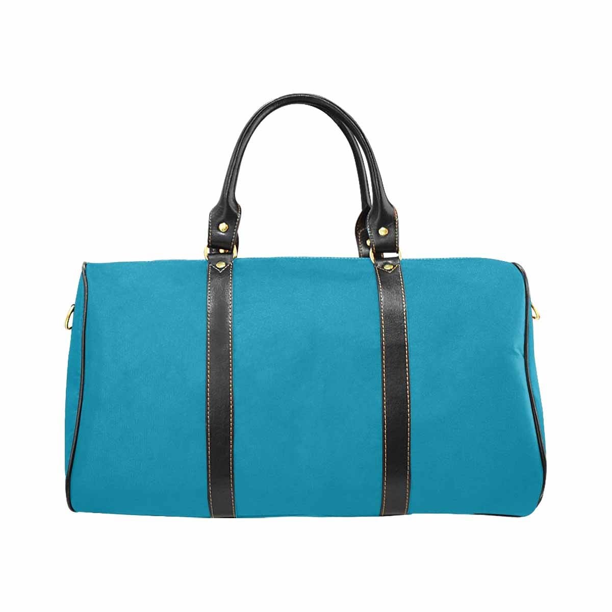 Large blue-green leather travel bag with waterproof fabric and spacious compartments, ideal for carry-on luggage.