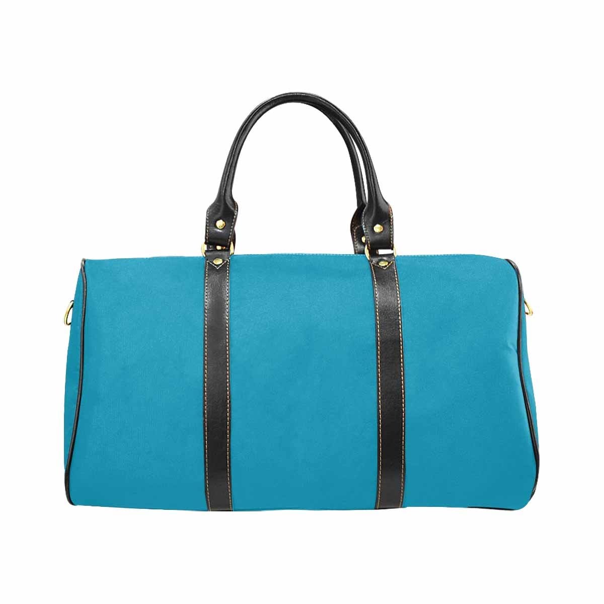 Large blue-green leather travel bag with waterproof fabric and spacious compartments, ideal for carry-on luggage.