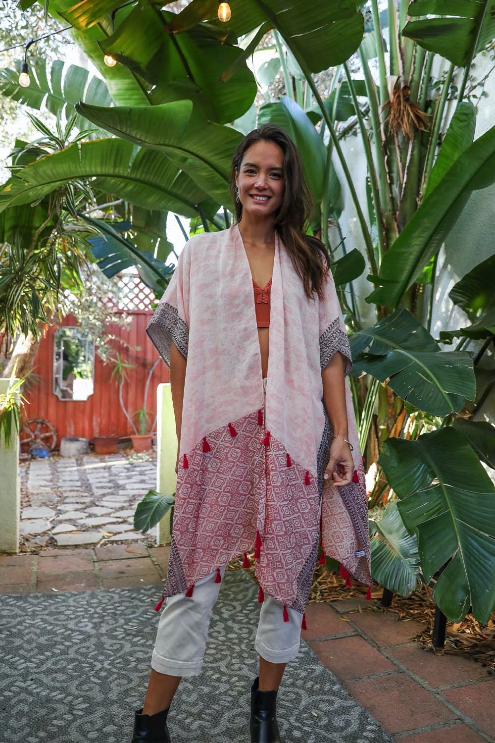 Tropical Leaves Draped Sleeve Kimono featuring a chic two-tone design and playful tassels, perfect for stylish layering.