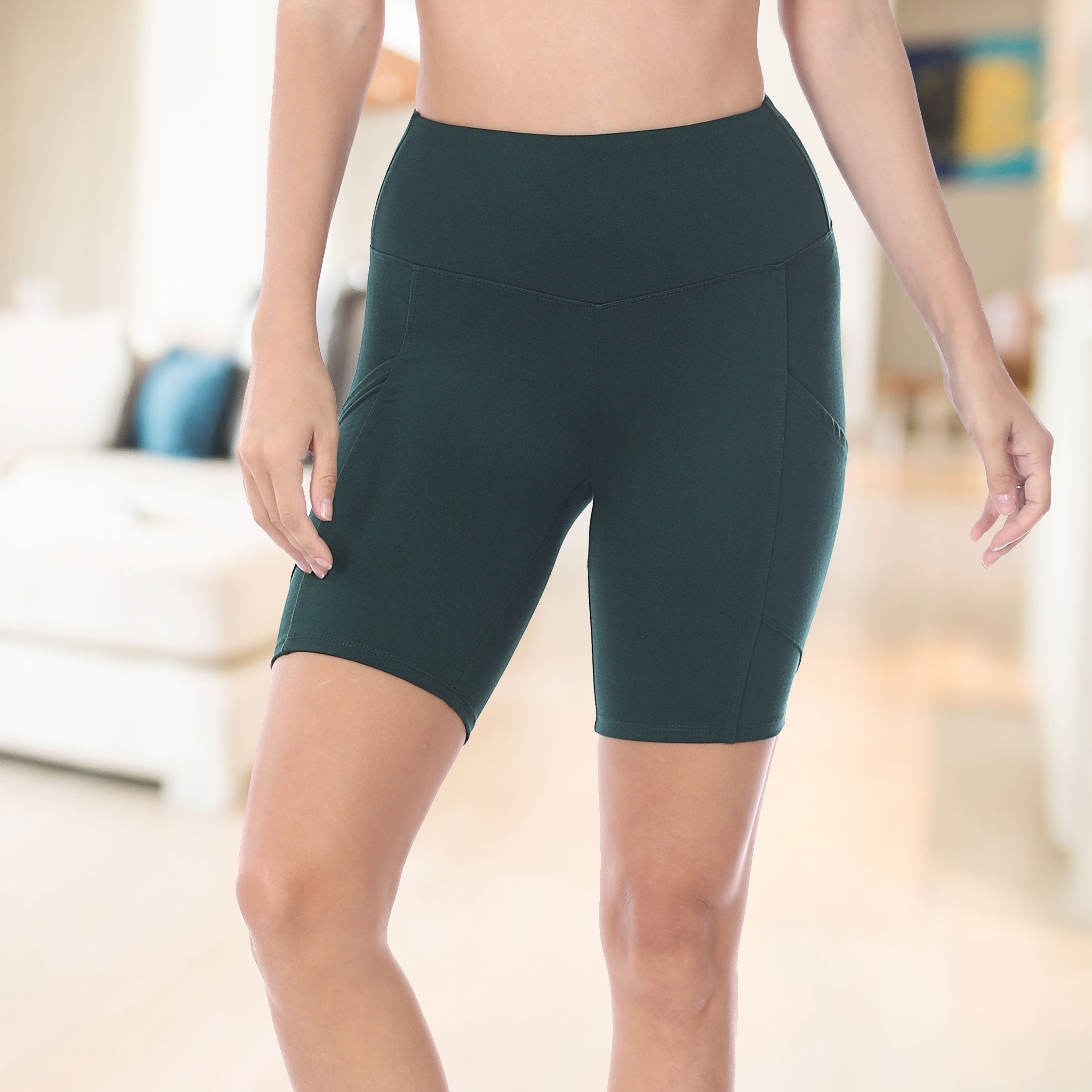 Tummy Control Biker Short Leggings in black with side cell phone pocket, showcasing a wide waistband and soft fabric.