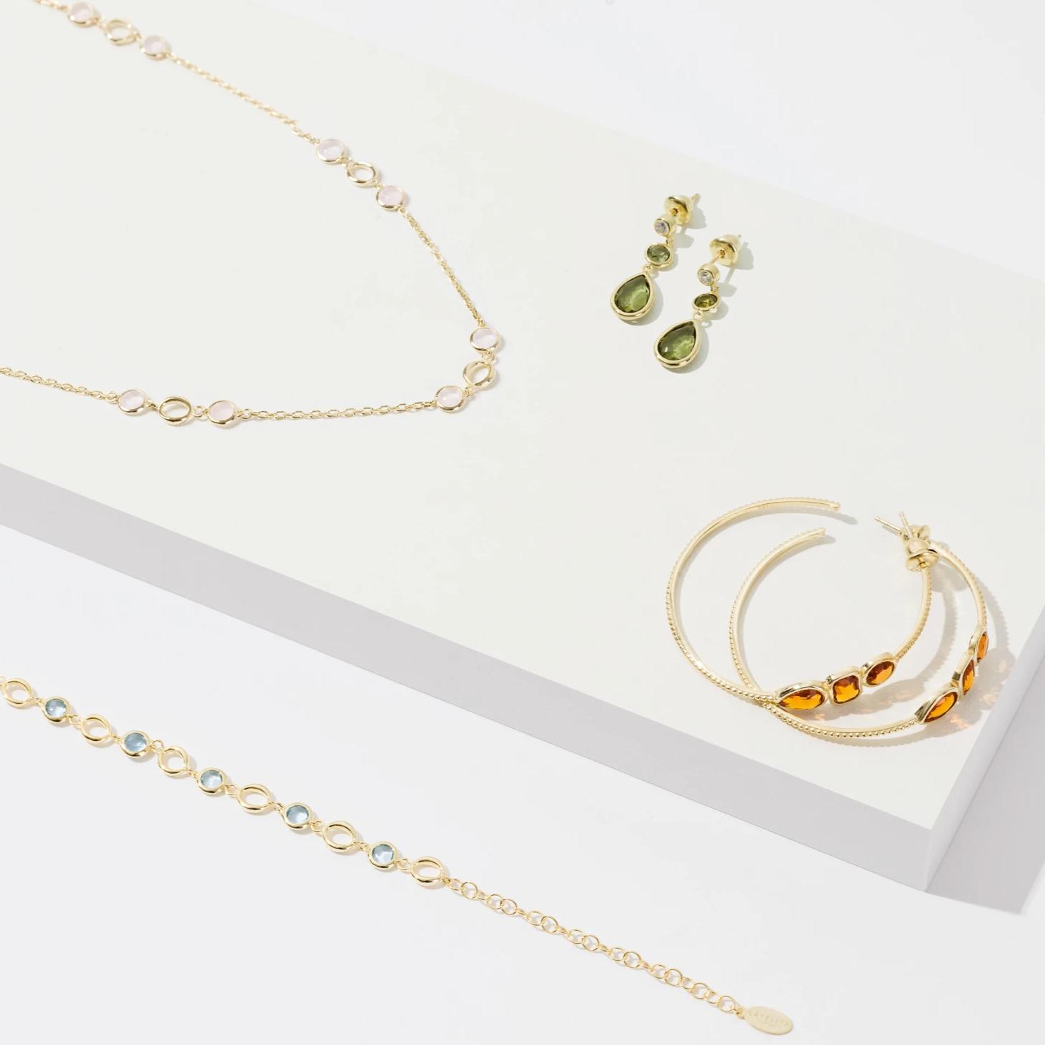 Tuscany Gemstone Drop Earring in Gold Citrine featuring teardrop gemstones and cubic zirconia, elegantly designed for delicate styling.