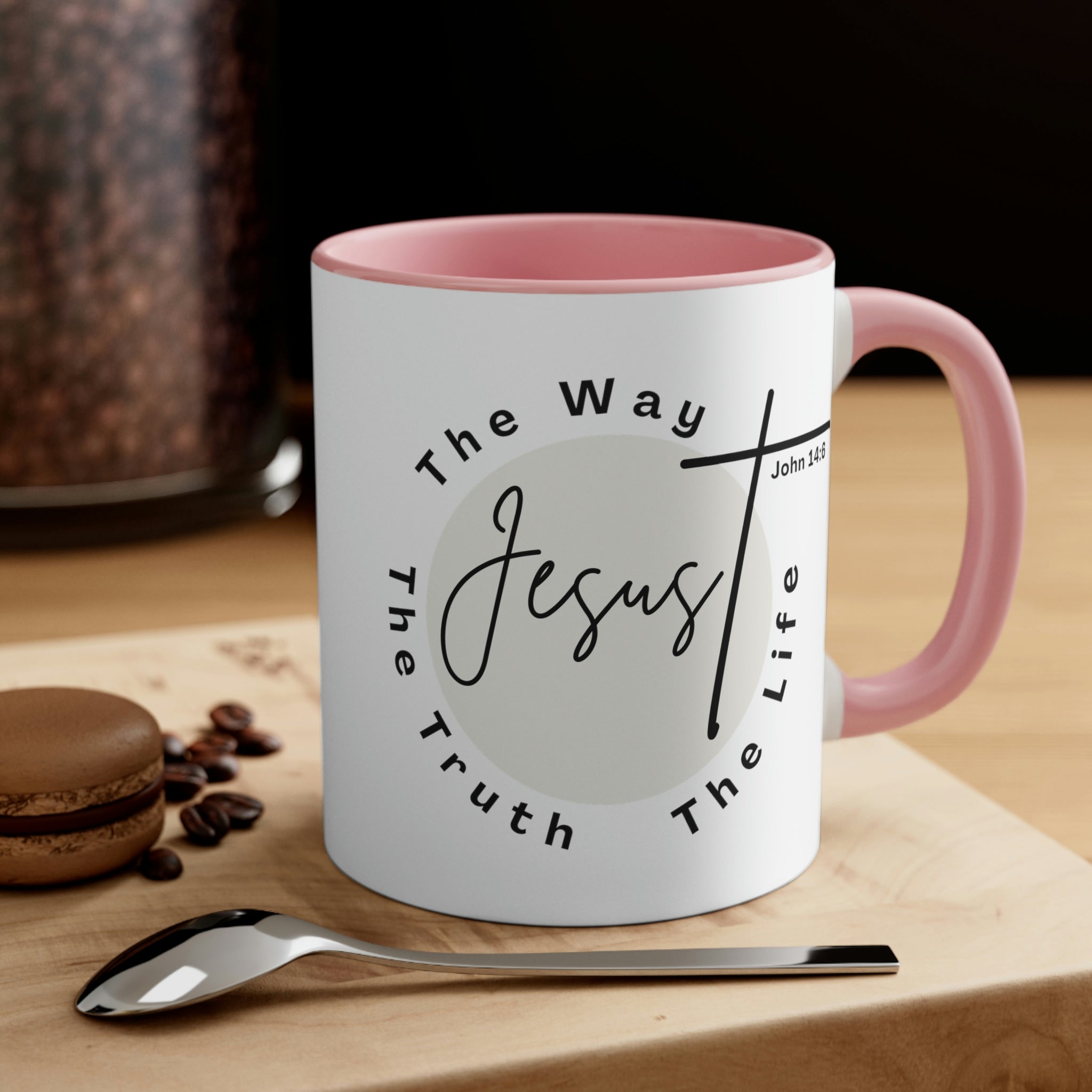 Two-tone ceramic mug with a C-handle featuring the phrase 'Jesus the Way the Truth the Life' in a vibrant design.