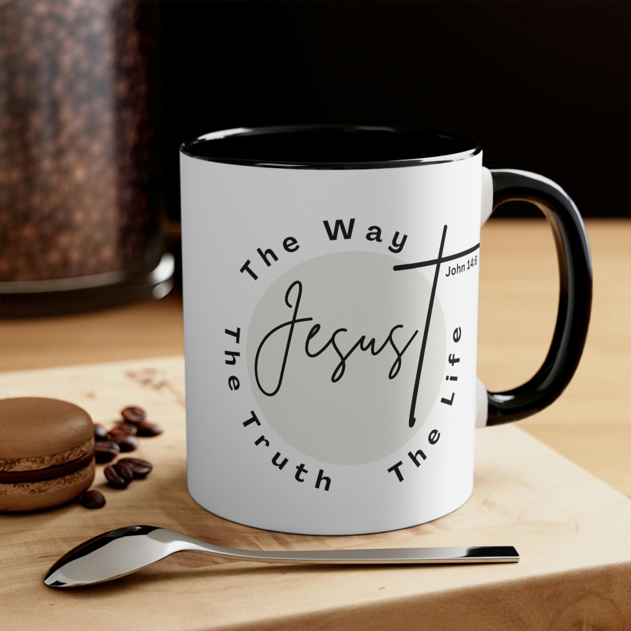 Two-tone ceramic mug with a C-handle featuring the phrase 'Jesus the Way the Truth the Life' in a vibrant design.