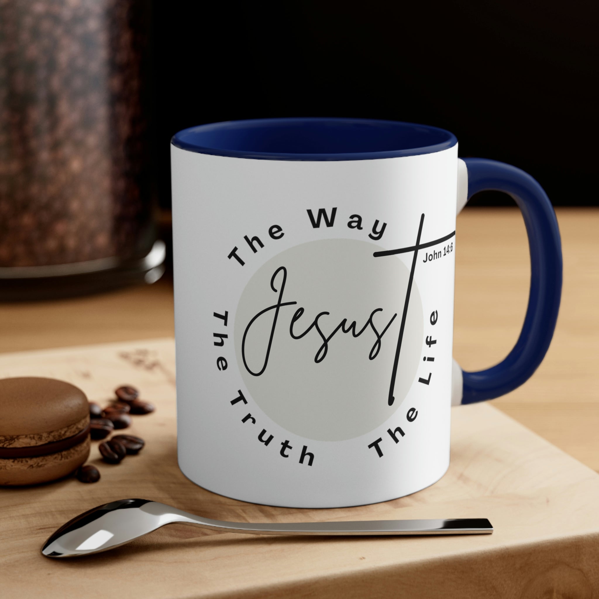 Two-tone ceramic mug with a C-handle featuring the phrase 'Jesus the Way the Truth the Life' in a vibrant design.