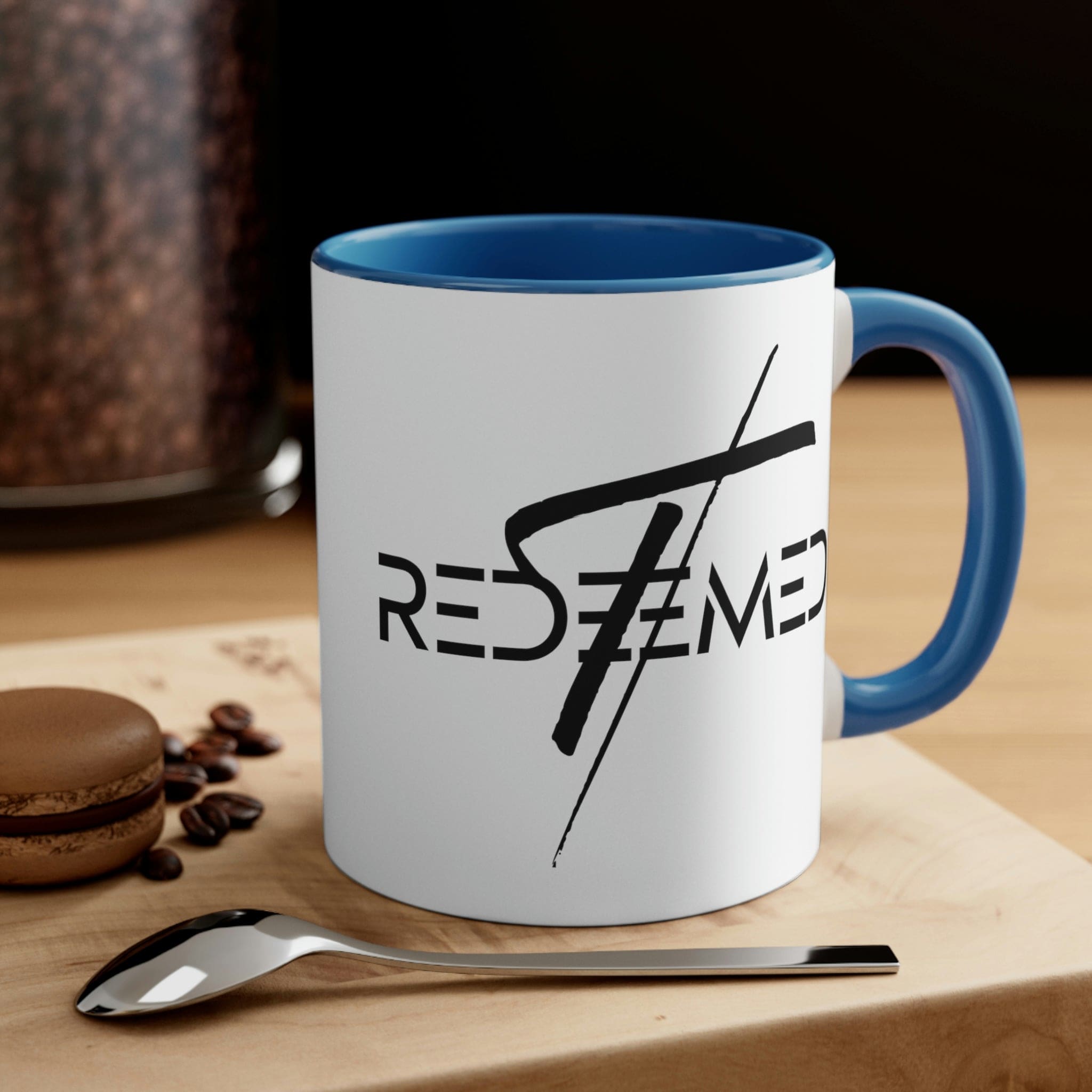 Two-tone Accent Ceramic Mug 11oz with Redeemed Christian Cross design, featuring a colored interior and C-handle for comfortable use.