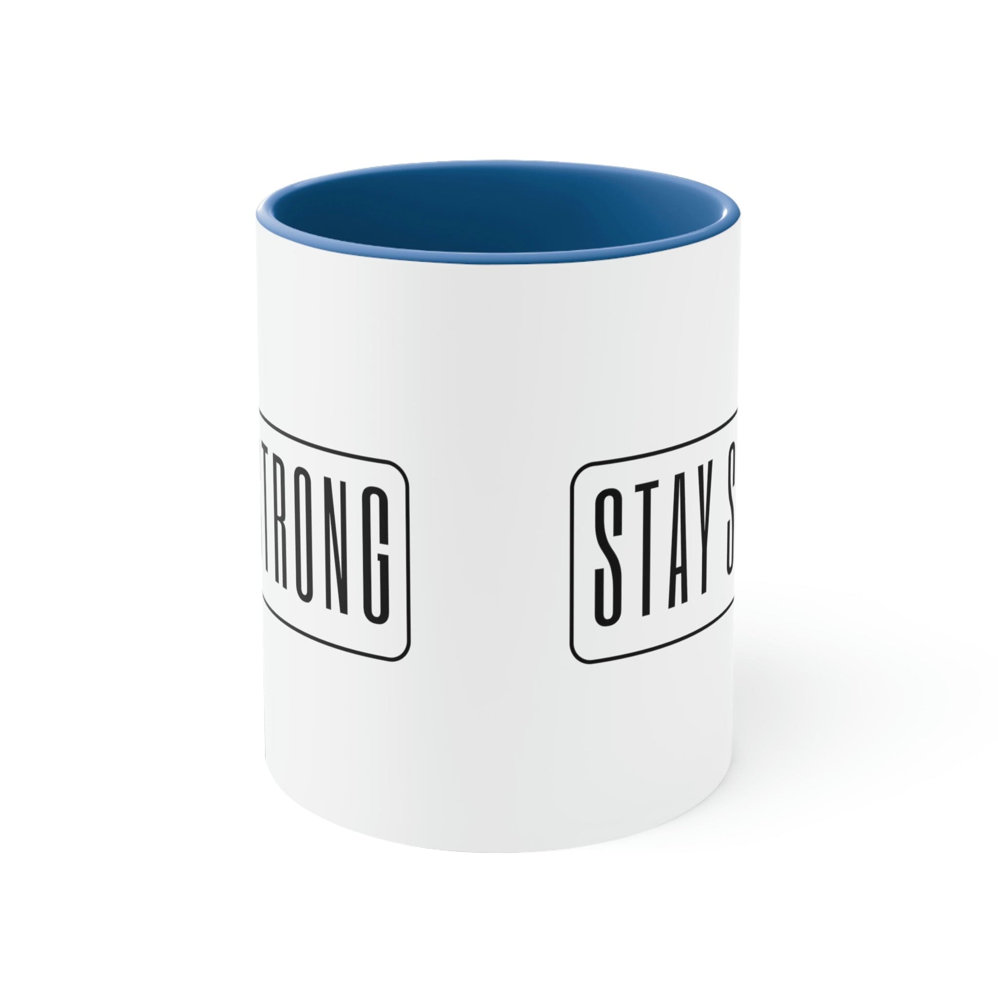Two-tone ceramic mug with a white exterior and colored interior featuring a Stay Strong illustration, showcasing a comfortable C-handle.