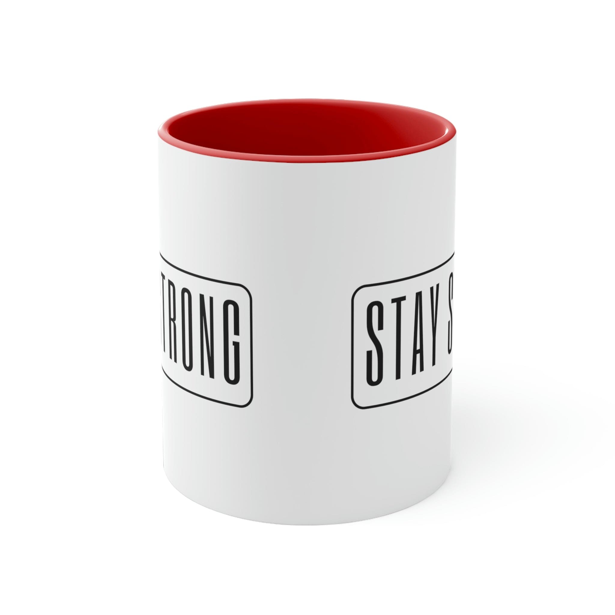 Two-tone ceramic mug with a white exterior and colored interior featuring a Stay Strong illustration, showcasing a comfortable C-handle.