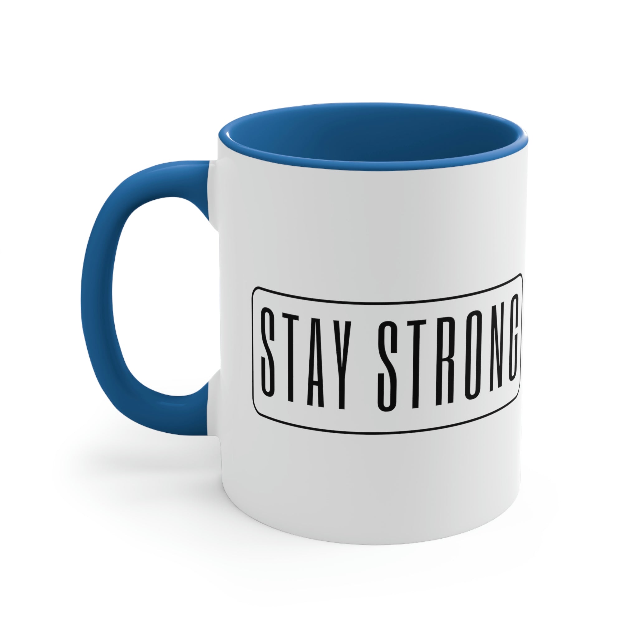 Two-tone ceramic mug with a white exterior and colored interior featuring a Stay Strong illustration, showcasing a comfortable C-handle.