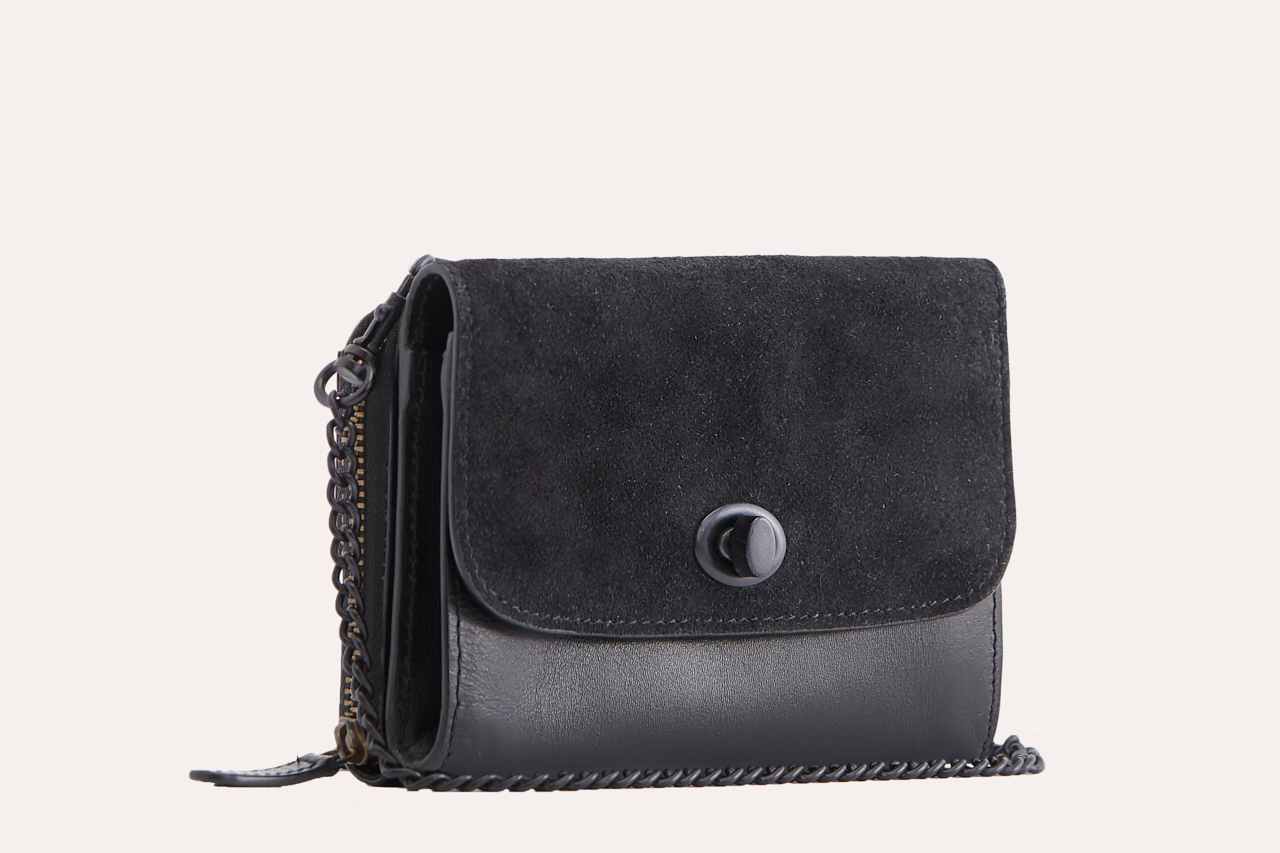 Stylish Two-Tone Crossbody bag made of genuine leather and suede, featuring a turn lock closure and removable chain strap.