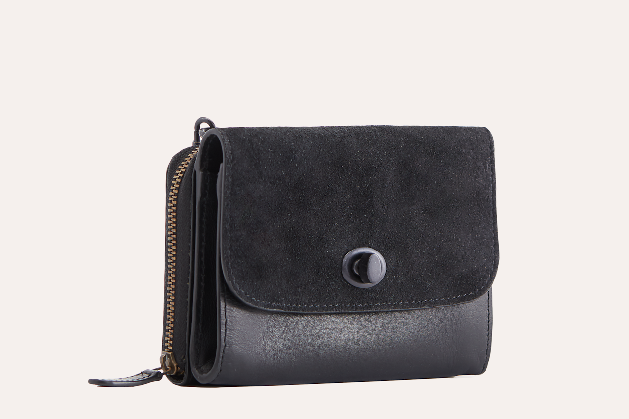 Stylish Two-Tone Crossbody bag made of genuine leather and suede, featuring a turn lock closure and removable chain strap.