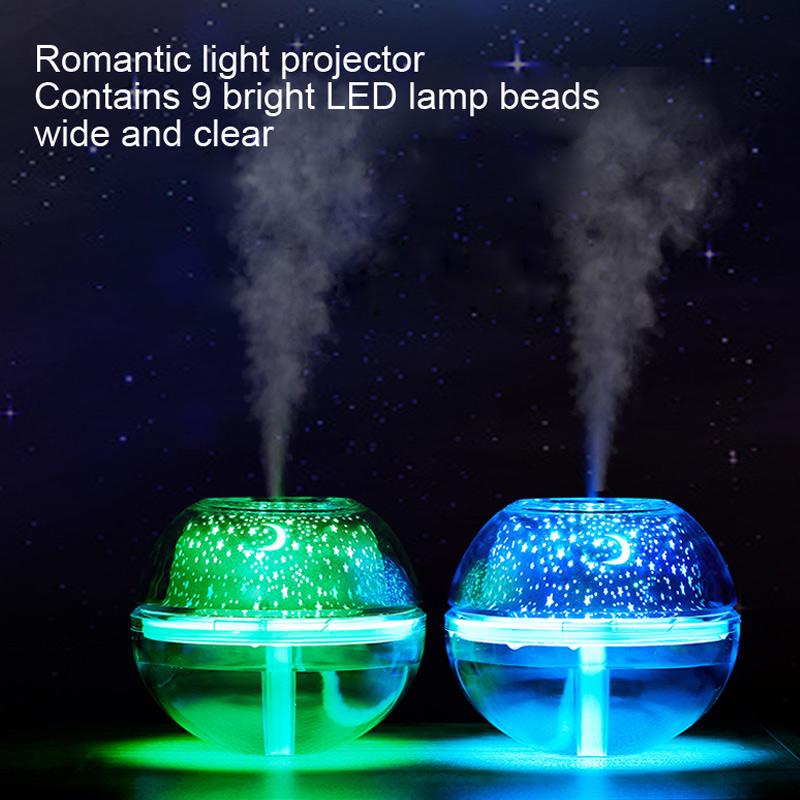 USB Crystal Night Lamp Projector with 500ml Air Humidifier, showcasing its sleek silver design and mist output.