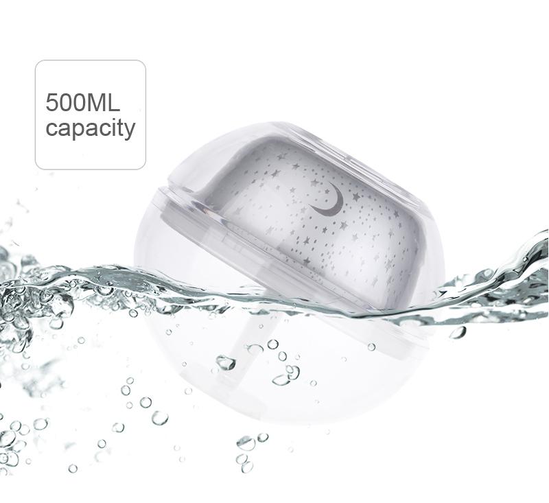 USB Crystal Night Lamp Projector with 500ml Air Humidifier, showcasing its sleek silver design and mist output.