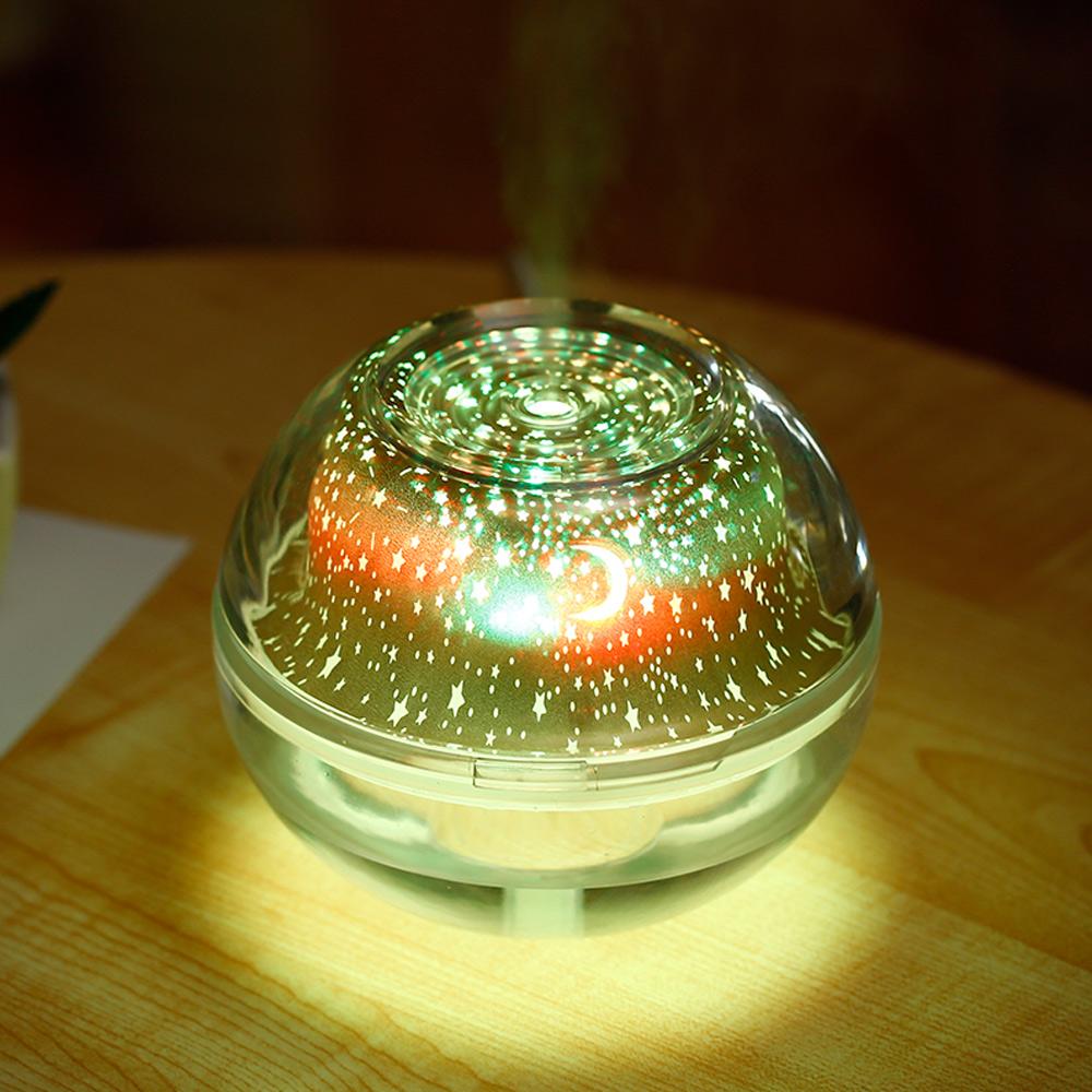 USB Crystal Night Lamp Projector with 500ml Air Humidifier, showcasing its sleek silver design and mist output.