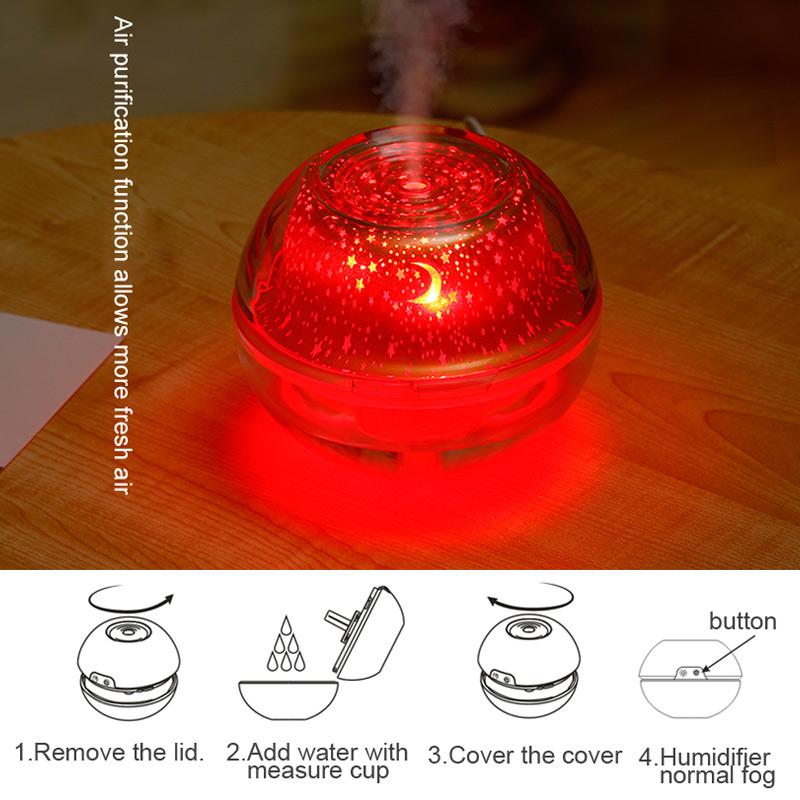 USB Crystal Night Lamp Projector with 500ml Air Humidifier, showcasing its sleek silver design and mist output.