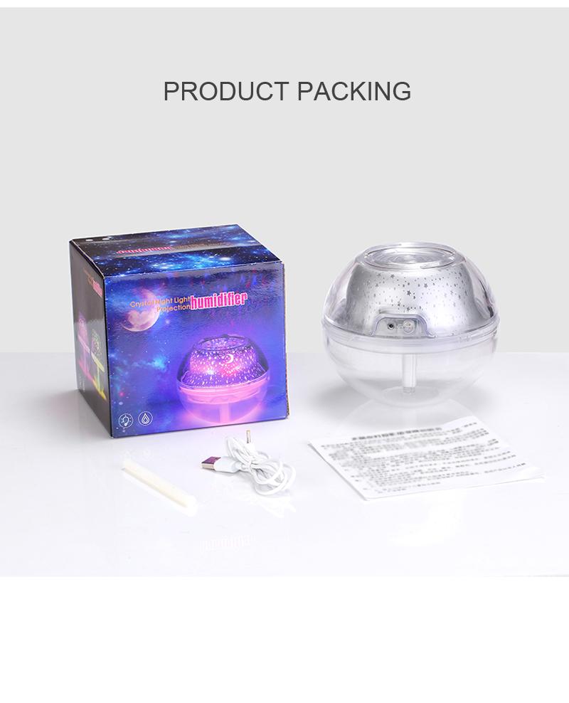 USB Crystal Night Lamp Projector with 500ml Air Humidifier, showcasing its sleek silver design and mist output.