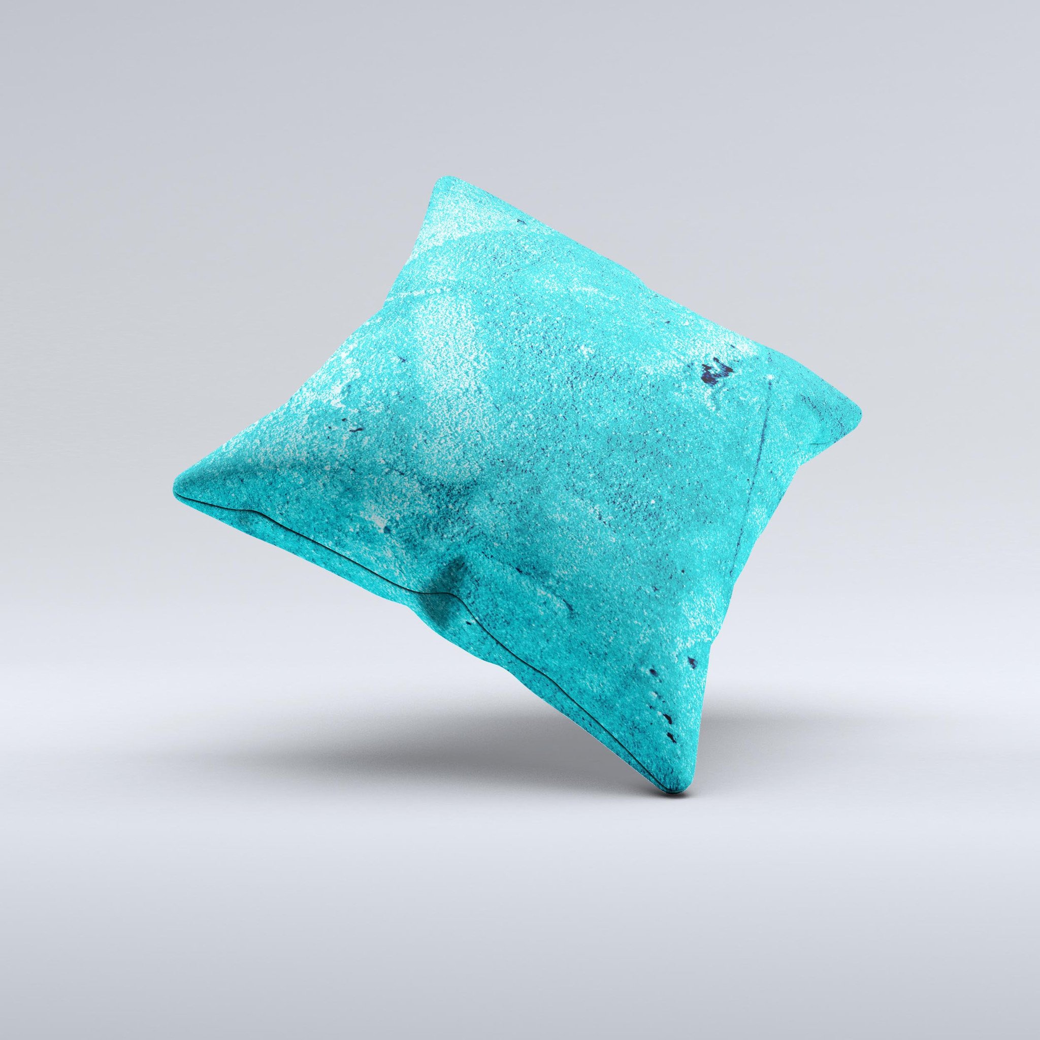 Vibrant blue decorative throw pillow with cement texture, handcrafted in Virginia, showcasing unique design and high-quality fabric.