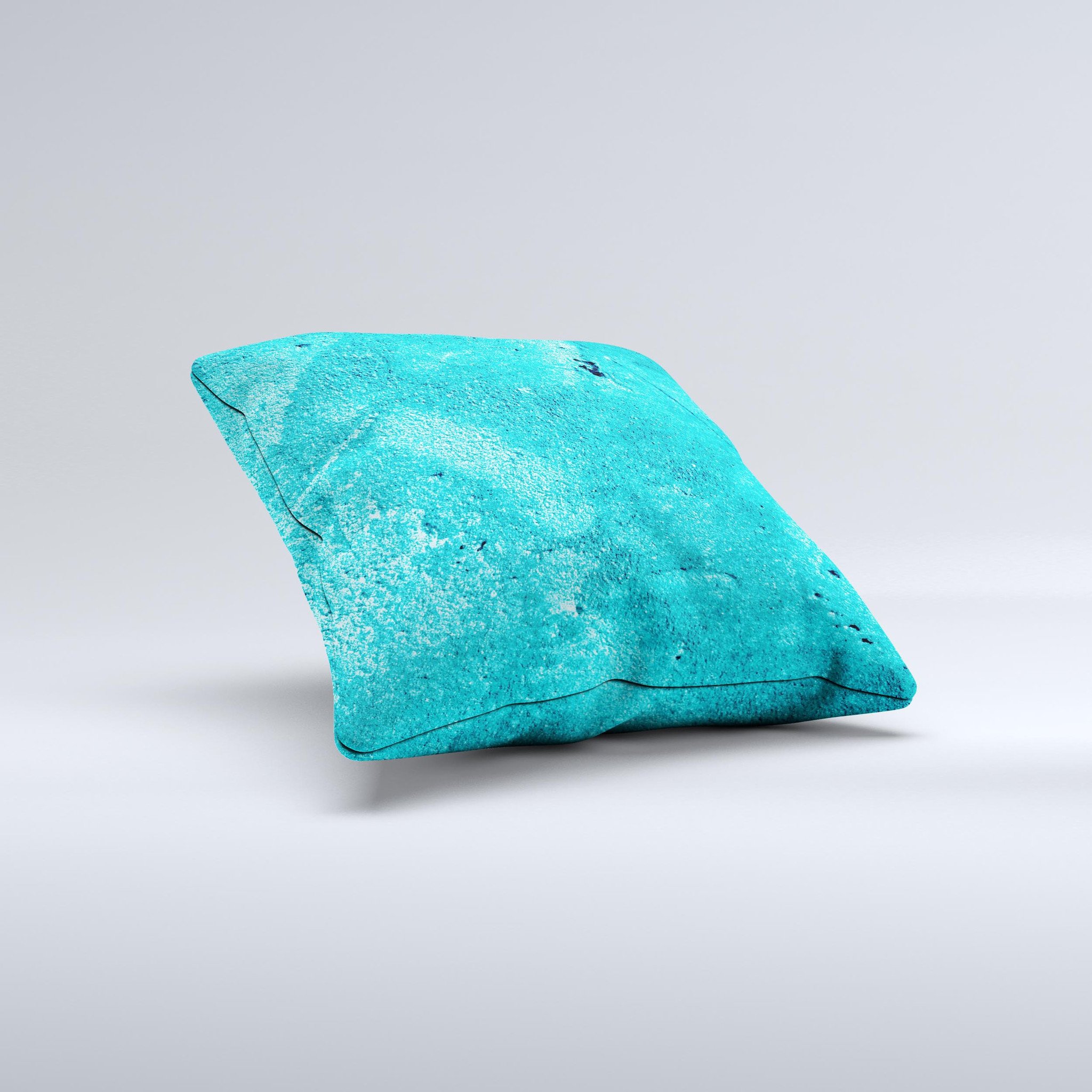 Vibrant blue decorative throw pillow with cement texture, handcrafted in Virginia, showcasing unique design and high-quality fabric.
