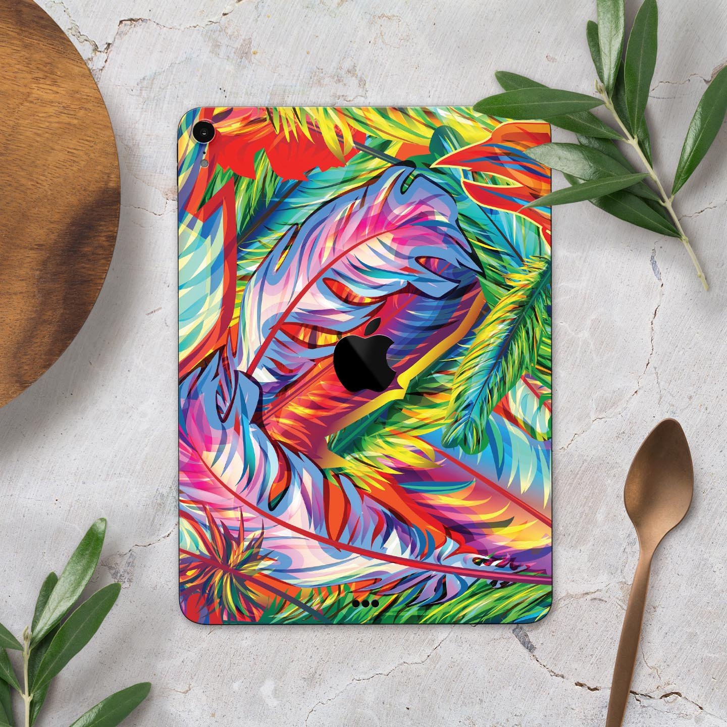 Vibrant colorful feathers skin decal for Apple iPad, showcasing intricate feather designs and premium finish.