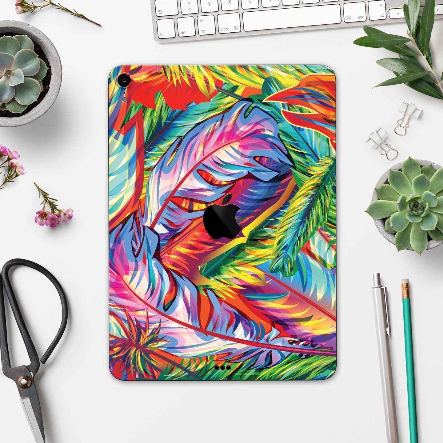 Vibrant colorful feathers skin decal for Apple iPad, showcasing intricate feather designs and premium finish.