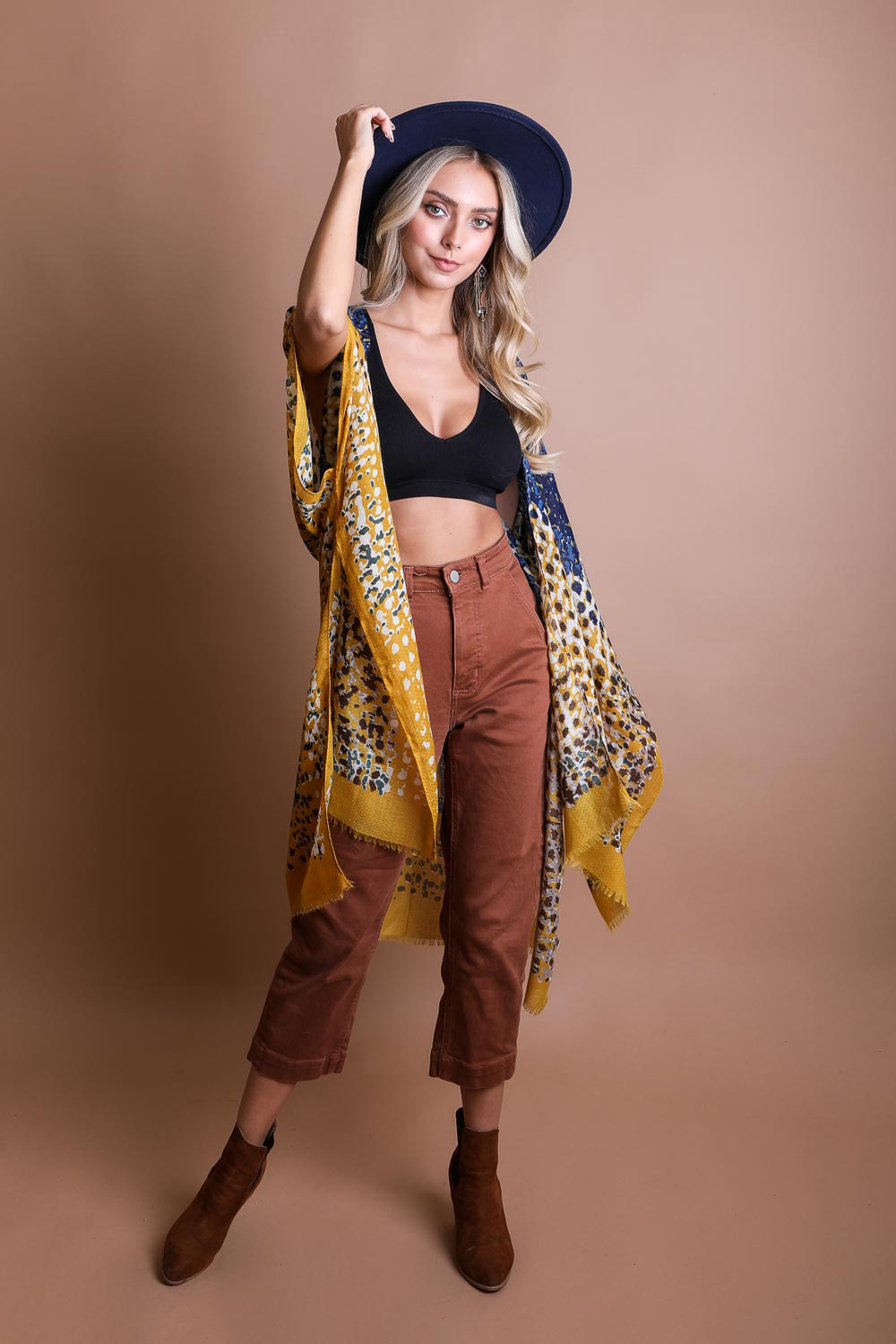 A vibrant multicolor frayed kimono showcasing a retro design, perfect for stylish layering.