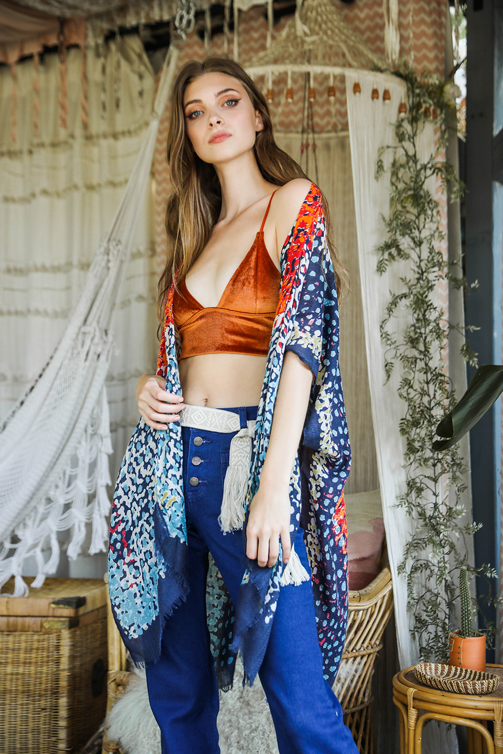 A vibrant multicolor frayed kimono showcasing a retro design, perfect for stylish layering.