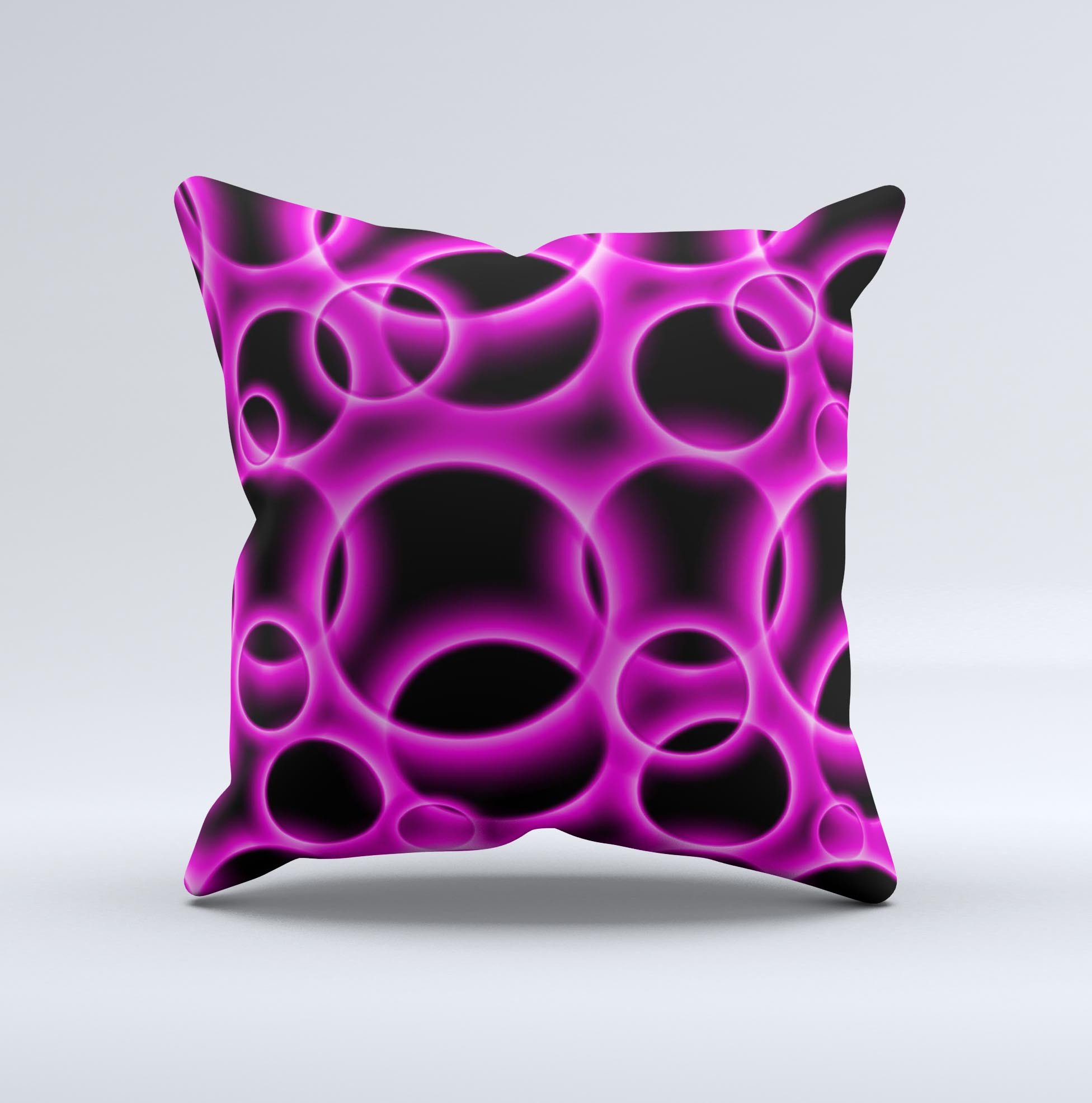 Vibrant pink decorative throw pillow with glowing cells design, handcrafted in Virginia, showcasing unique patterns and high-quality fabric.