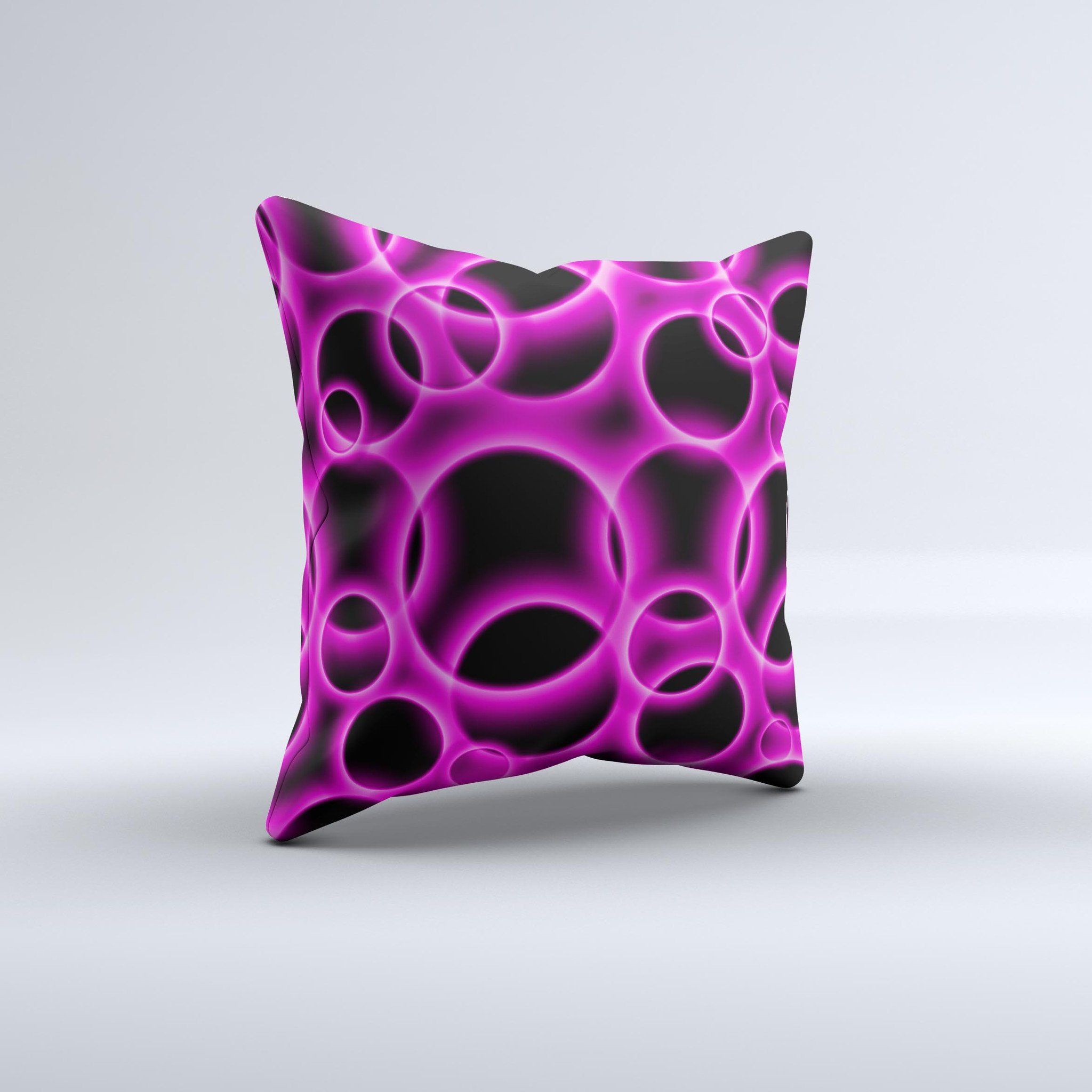 Vibrant pink decorative throw pillow with glowing cells design, handcrafted in Virginia, showcasing unique patterns and high-quality fabric.