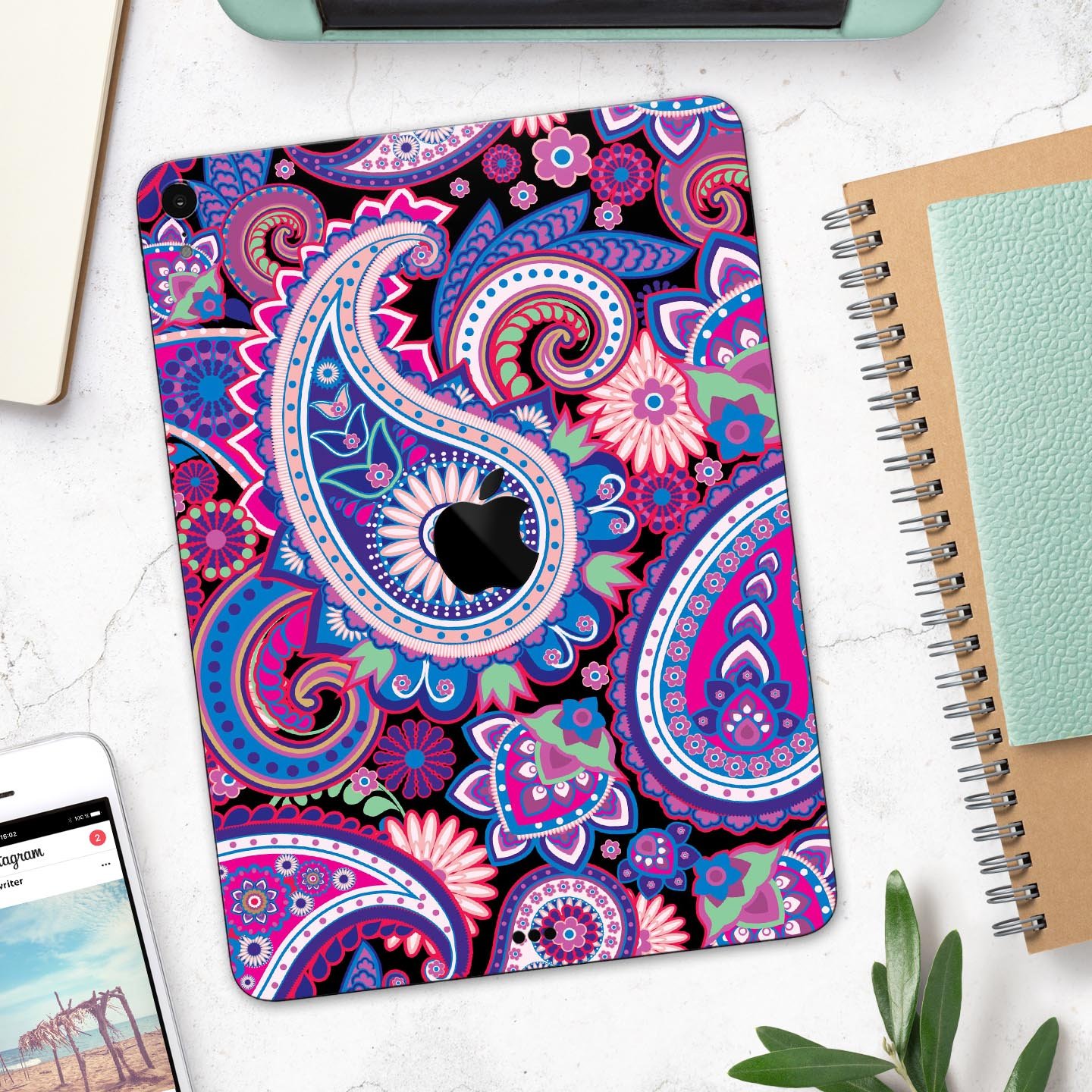 Vibrant Purple Paisley V5 skin decal for Apple iPad, showcasing intricate paisley design and premium finish.