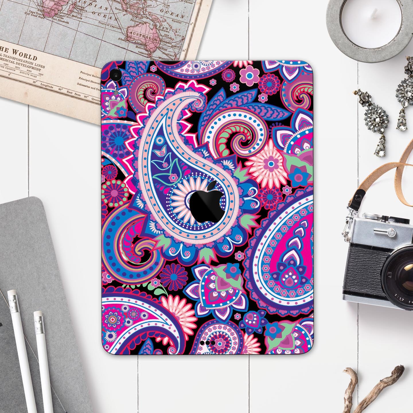 Vibrant Purple Paisley V5 skin decal for Apple iPad, showcasing intricate paisley design and premium finish.