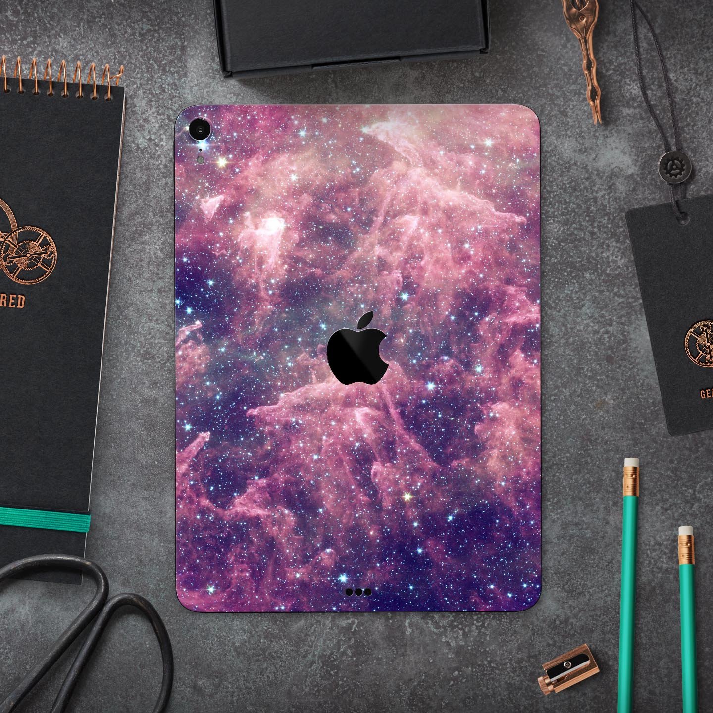 Vibrant Sparkly Pink Nebula skin decal for Apple iPad, showcasing a colorful and protective design.