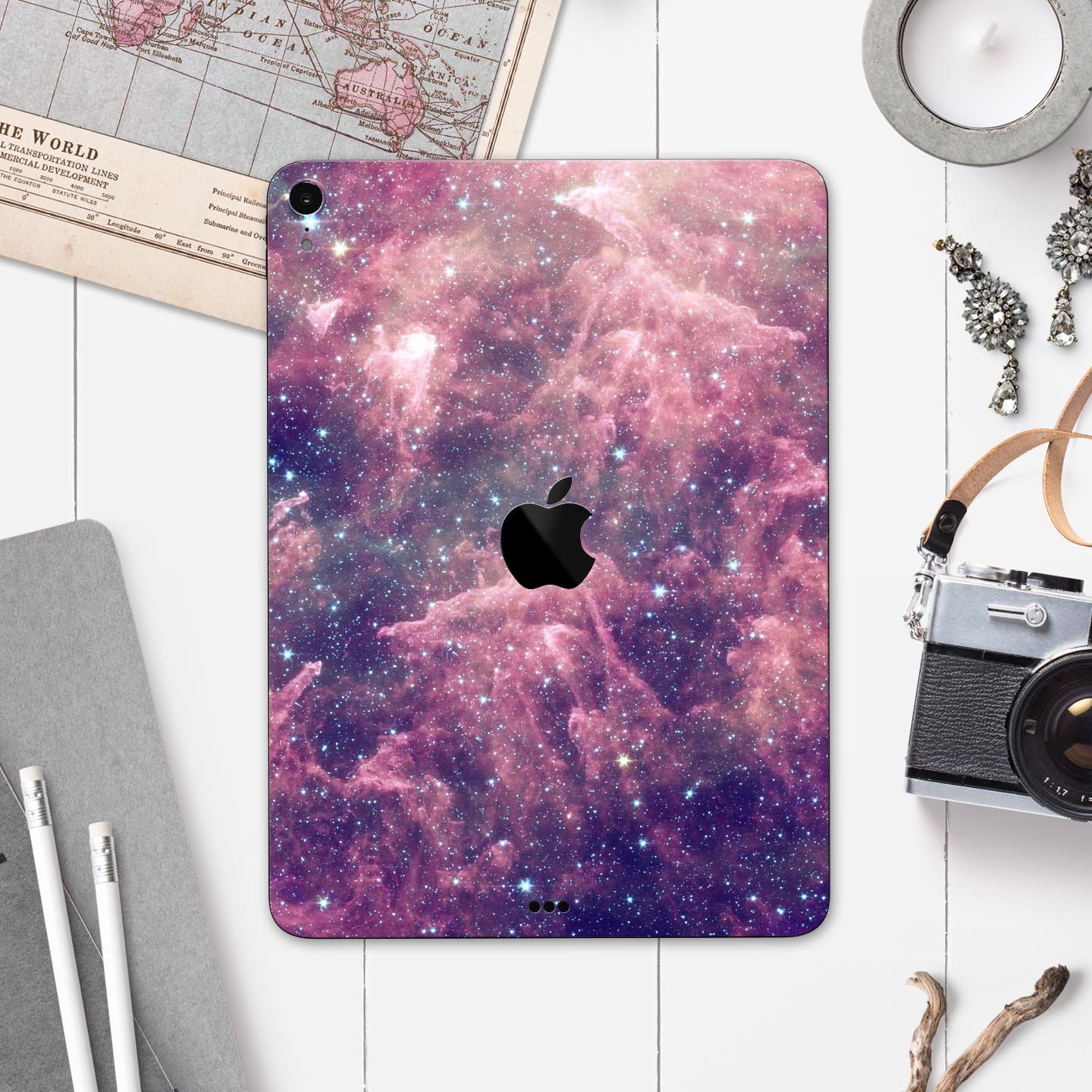 Vibrant Sparkly Pink Nebula skin decal for Apple iPad, showcasing a colorful and protective design.