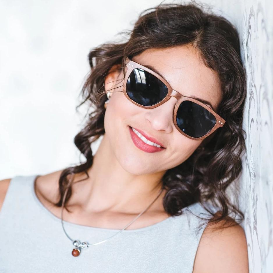 Waidzeit Forest View Sunglasses made of walnut wood, showcasing a stylish and lightweight design.