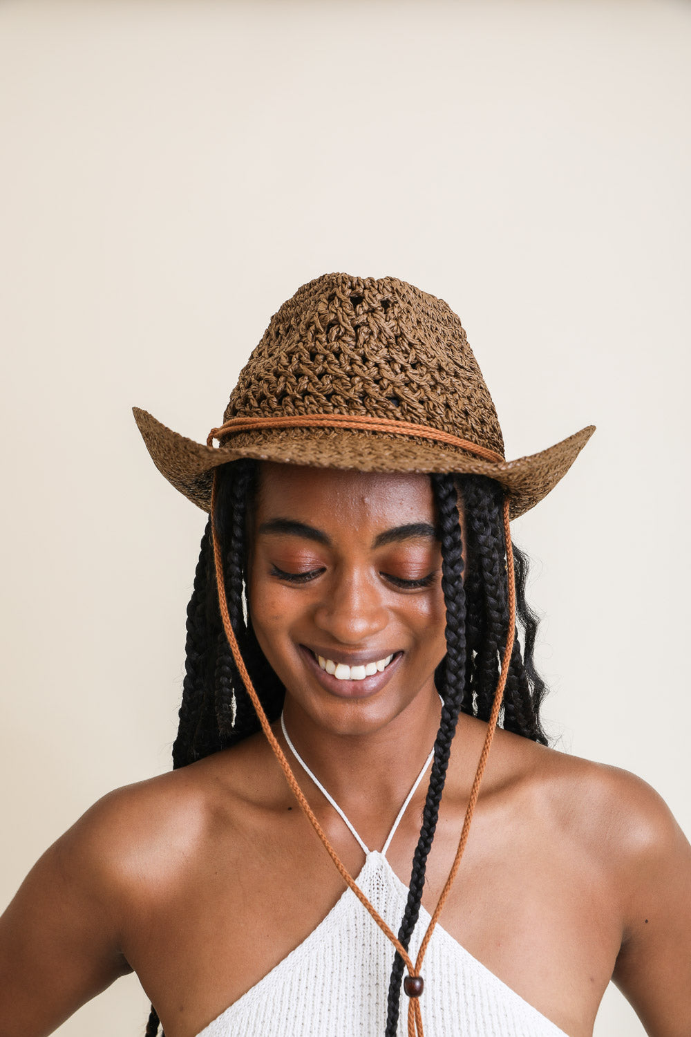 A stylish Weaved Western Cowboy Hat featuring intricate weaving, perfect for Boho-Cowboy outfits.