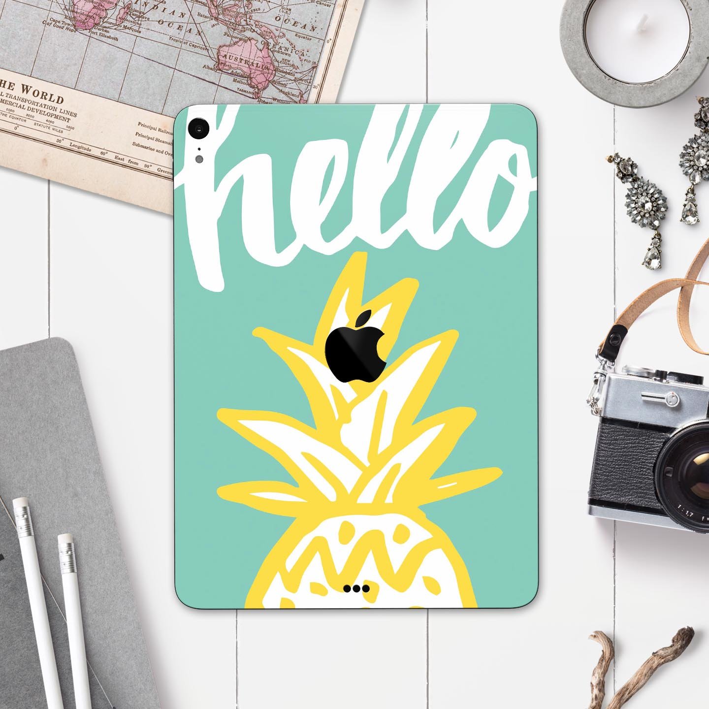 Well Hello Pineapple full body skin decal for Apple iPad Pro, featuring a vibrant pineapple design on a protective layer.