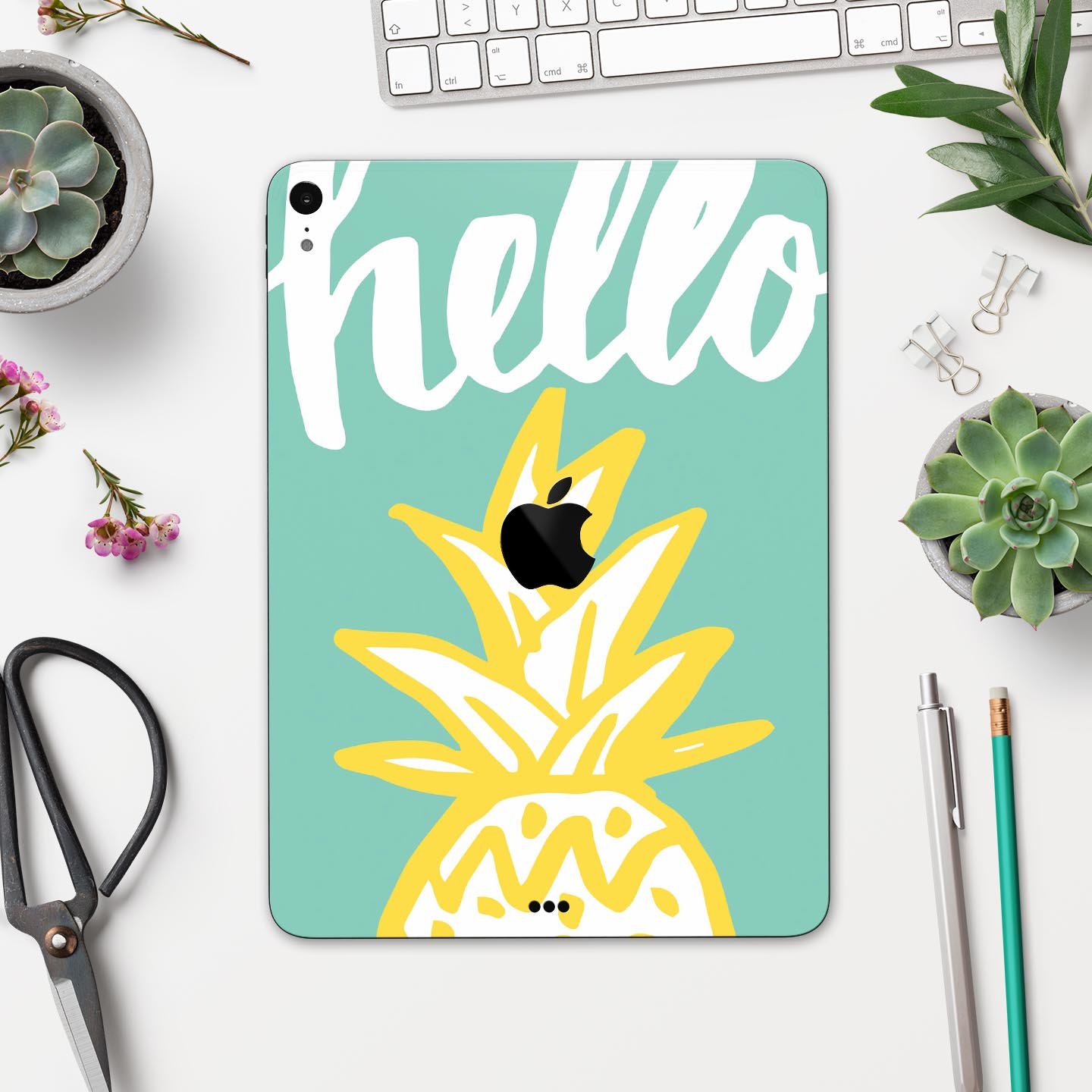 Well Hello Pineapple full body skin decal for Apple iPad Pro, featuring a vibrant pineapple design on a protective layer.
