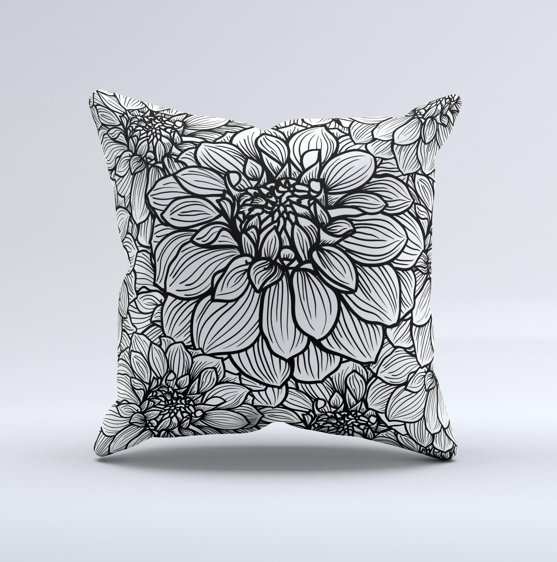 A beautifully handcrafted throw pillow featuring a white and black flower illustration, showcasing unique design and high-quality fabric.