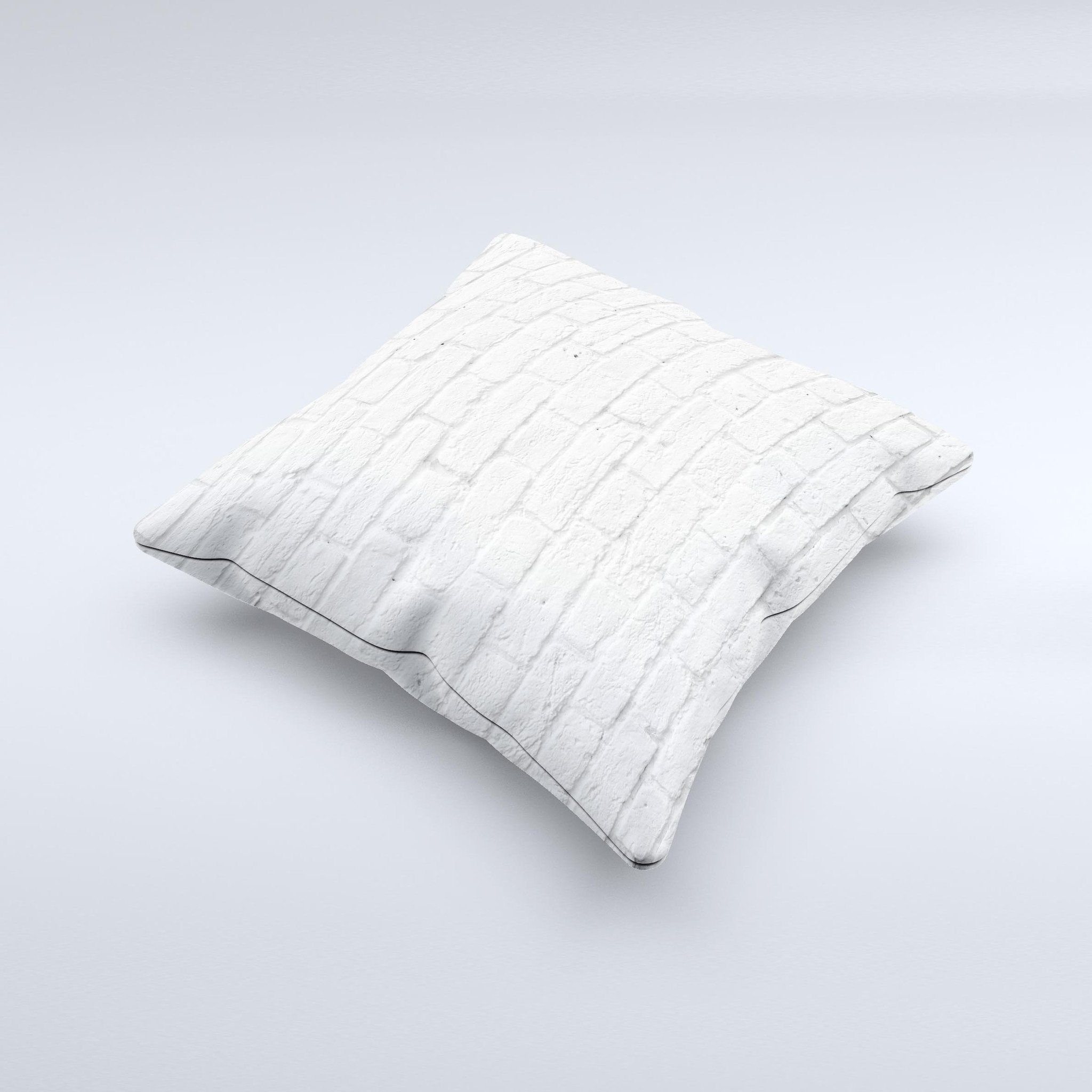 A stylish White Brick Wall Ink-Fuzed Decorative Throw Pillow featuring a unique brick wall design, handcrafted in Virginia.