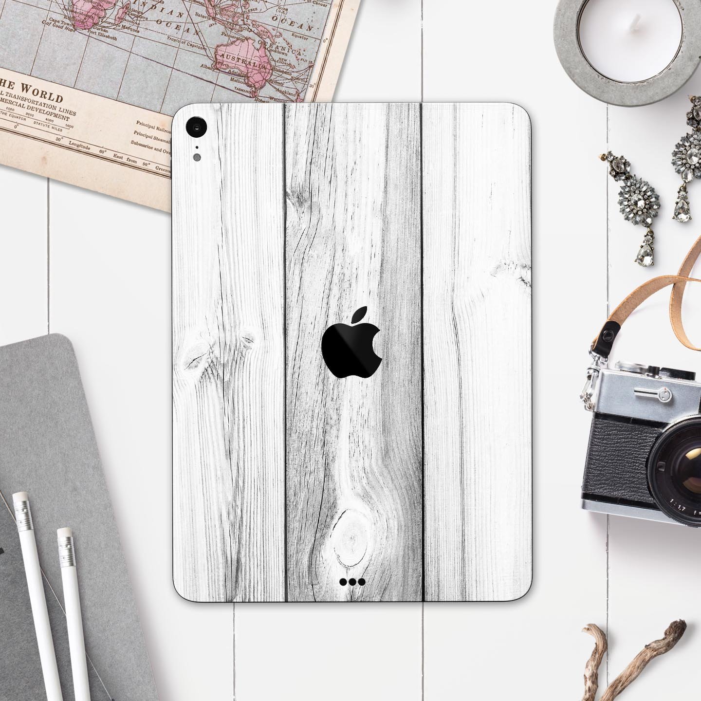 White and gray wood planks skin decal for Apple iPad Pro, showcasing a stylish and protective design.