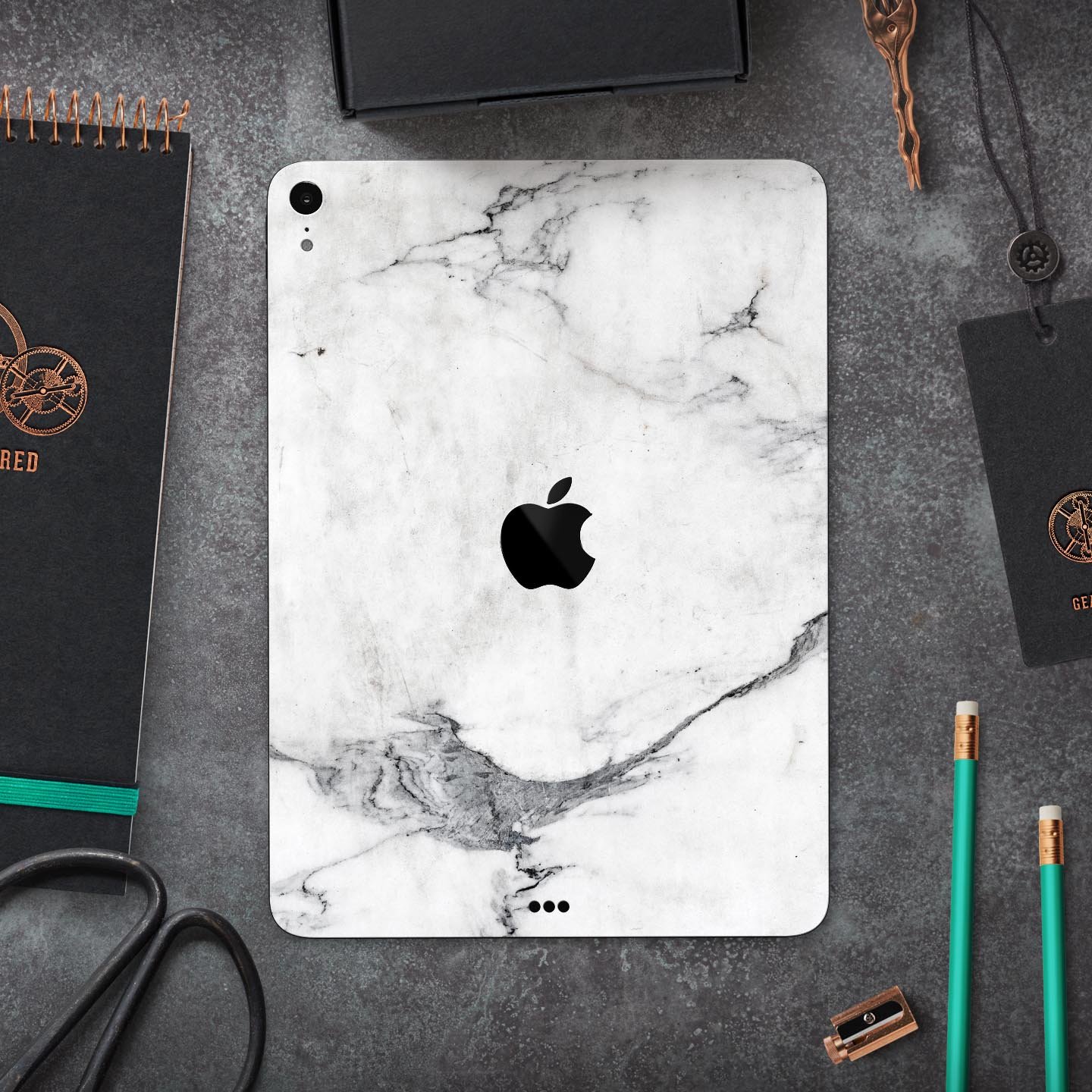 White and grey marble skin decal for Apple devices, showcasing a sleek and stylish design with a premium finish.