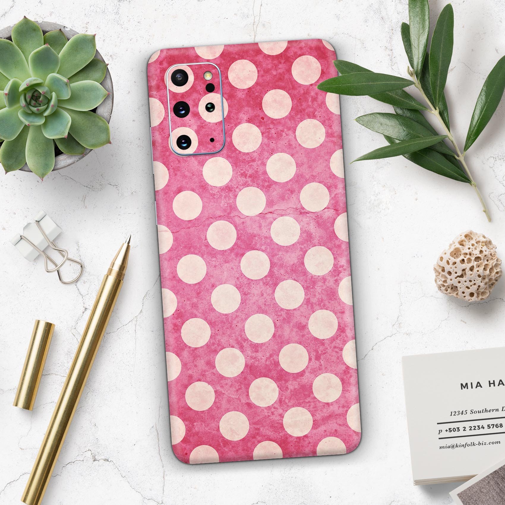 White polka dots design on a grungy pink background for Samsung Galaxy skin, showcasing a stylish and protective accessory.