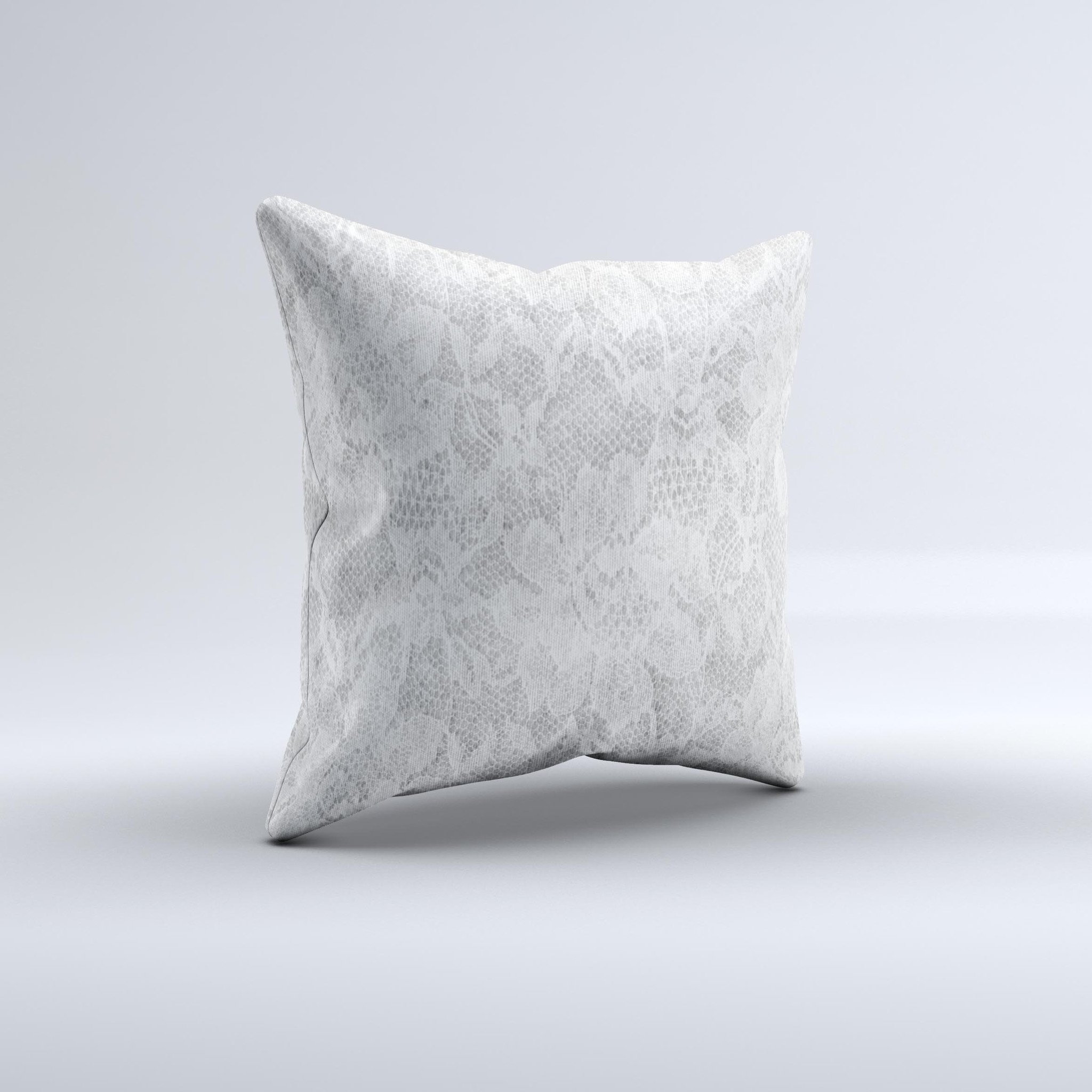 A beautifully handcrafted white textured lace decorative throw pillow with intricate ink-fuzed design, showcasing its unique and artisanal quality.