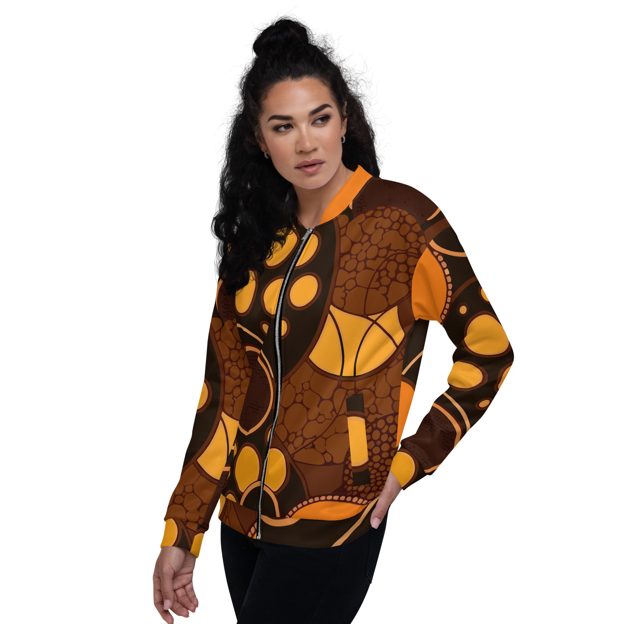 Women's bomber jacket featuring an orange and brown spotted print, zip-front closure, and ribbed cuffs, perfect for stylish layering.