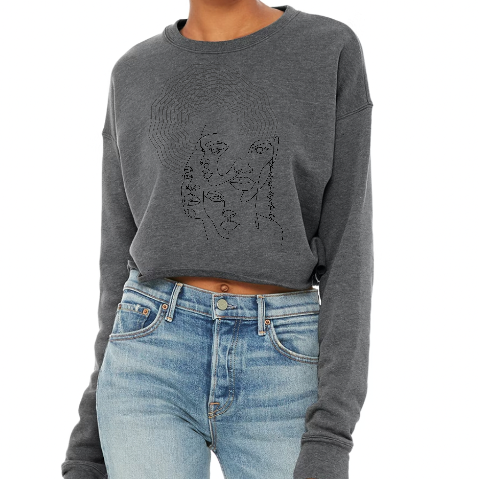 A stylish women's cropped graphic sweatshirt in soft fleece, featuring the phrase 'Every Woman is Wonderfully Made' in a modern font.